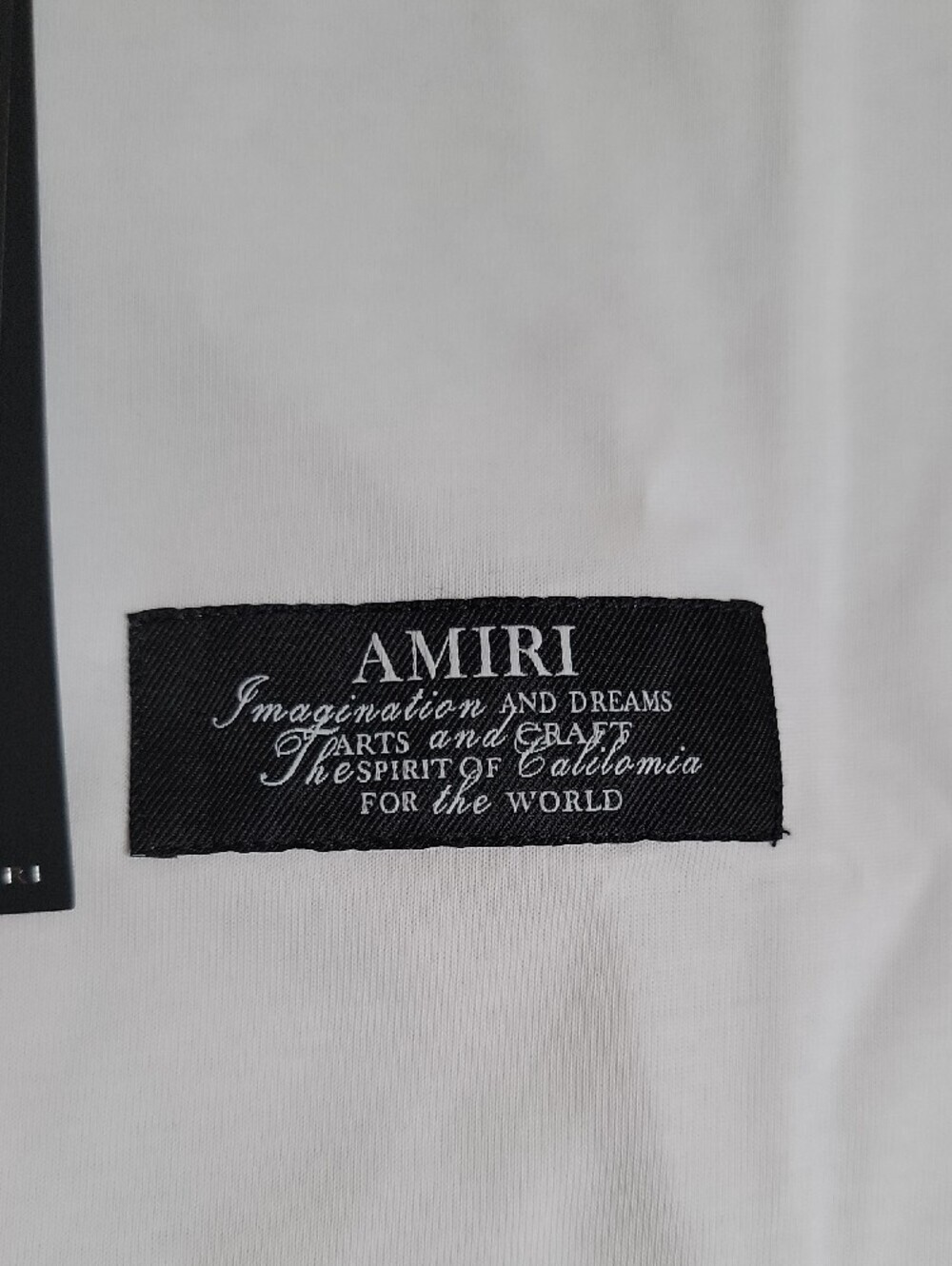 AMIRI White Short Sleeve T-Shirt with Black Chest Patch - Picture 3 of 5